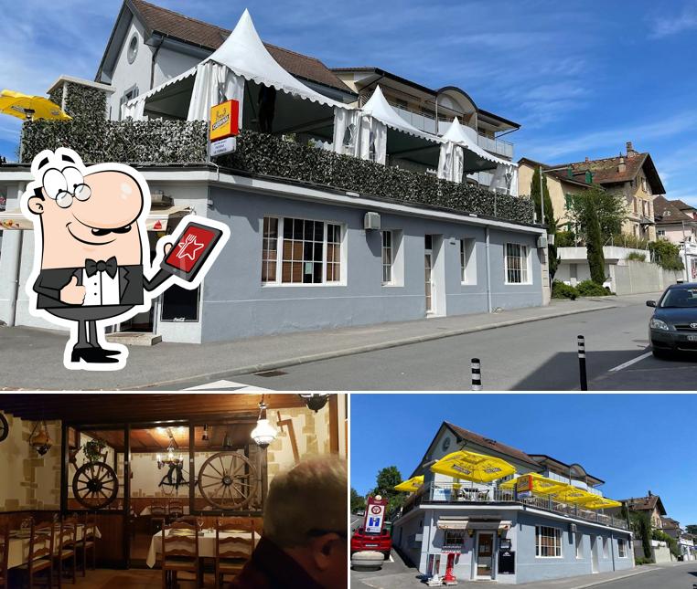 La foto di esterno e interni da Restaurant-Pizzeria La Terrasse