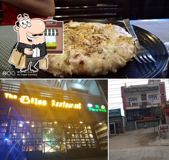 The photo of The Bliss Restaurant’s exterior and pizza