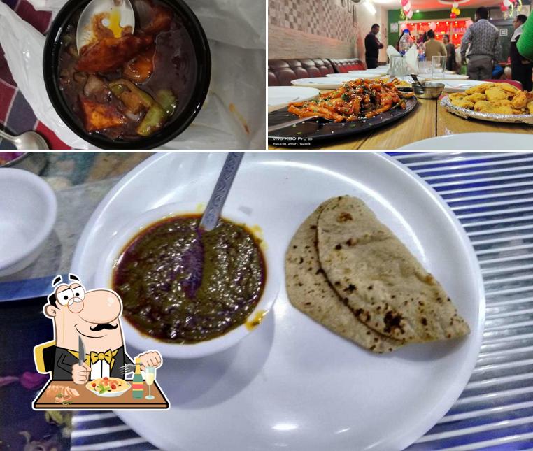 Check out the picture displaying food and dining table at Mago Restaurant