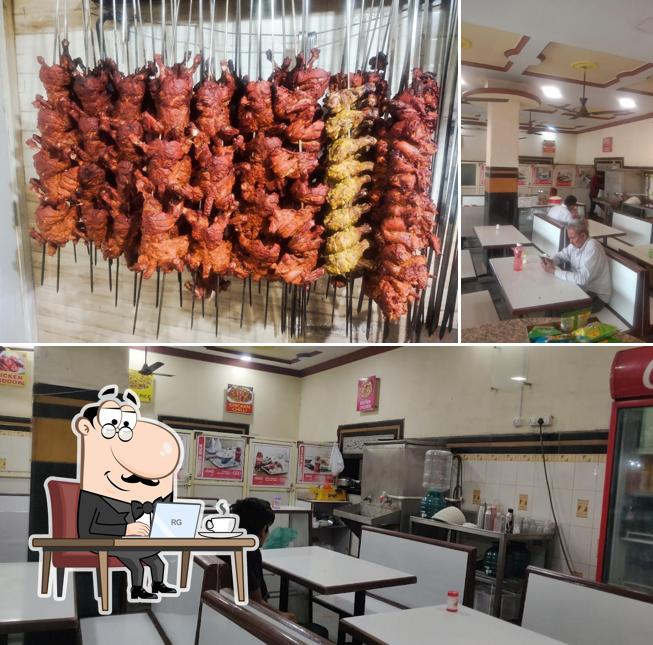 Take a seat at one of the tables at National Hotel