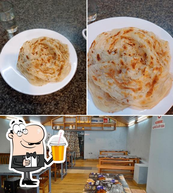 Enjoy a drink at Yum-Yum Restaurant