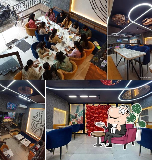 The interior of Munch N Mime - Restaurant N Cafe, at Geeta Bhawan Square