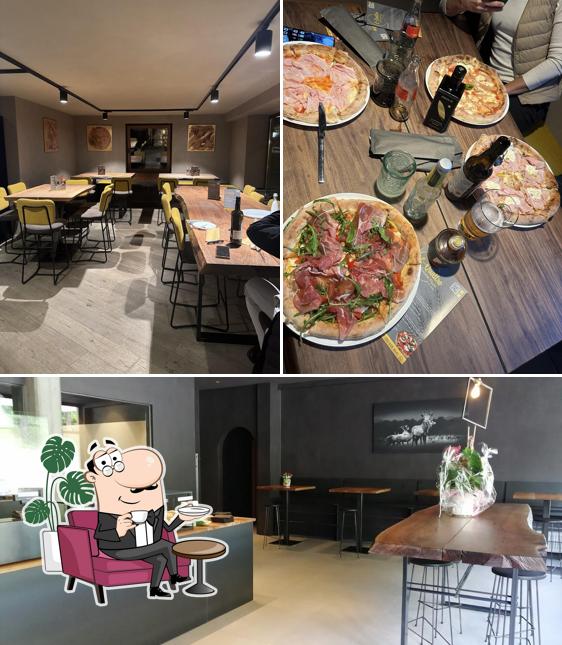 Dai un'occhiata agli interni di E-Quattro Pizza Genuine