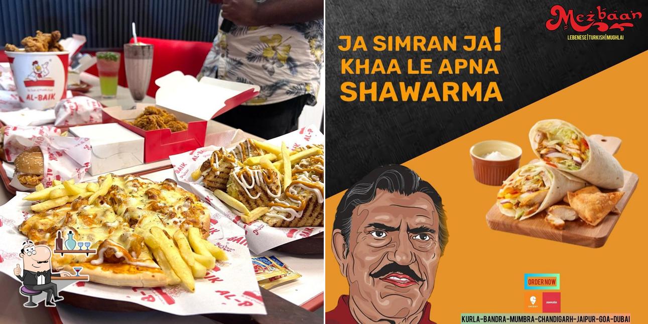 Take a seat at one of the tables at AL-Baik Mau