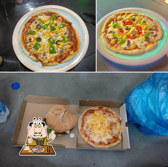 Get pizza at Cafe Harmony by Harry Dhillon