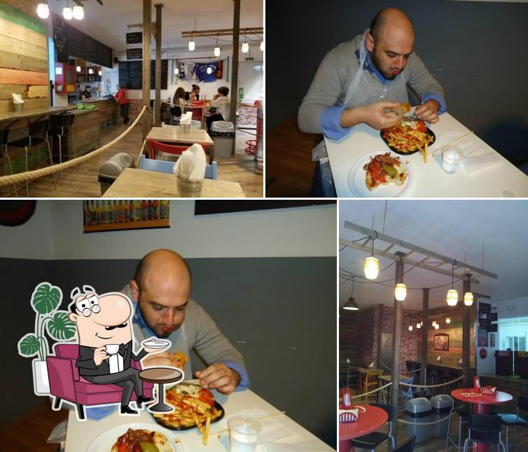 Dai un'occhiata agli interni di Carnivorous Panineria Hamburgheria