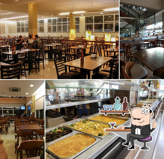 Sente em uma das mesas no Empório de Fátima Delicatessen