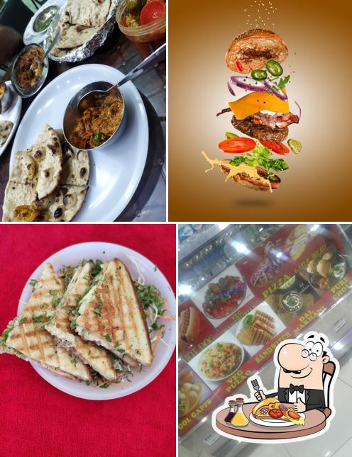 Try out pizza at PUNJABI KITCHEN 99