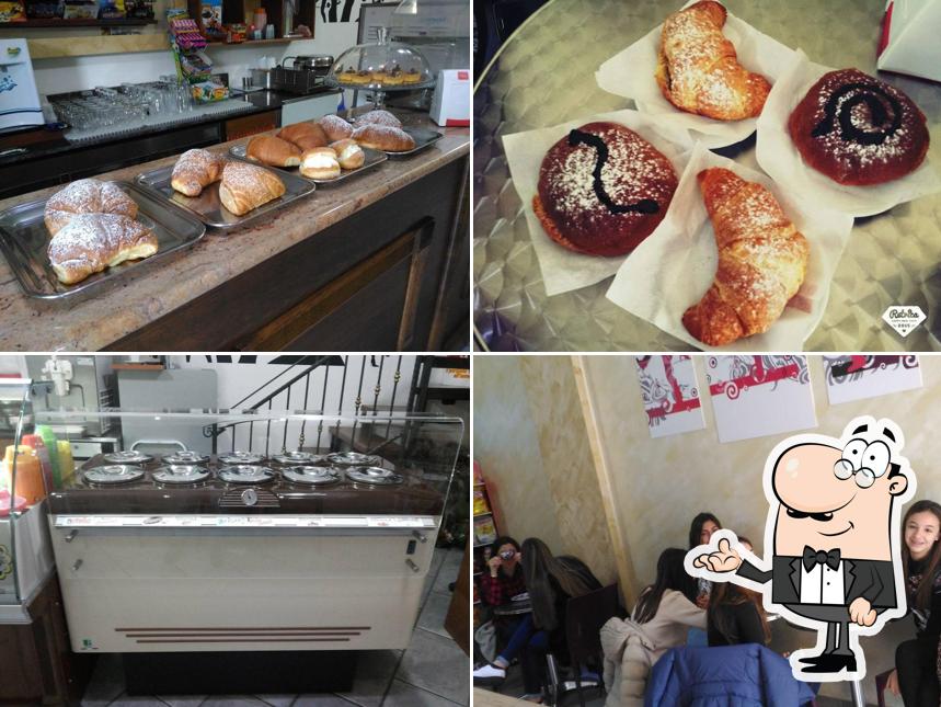 Gelateria yogurteria La Dolce Vita si caratterizza per la interni e cibo