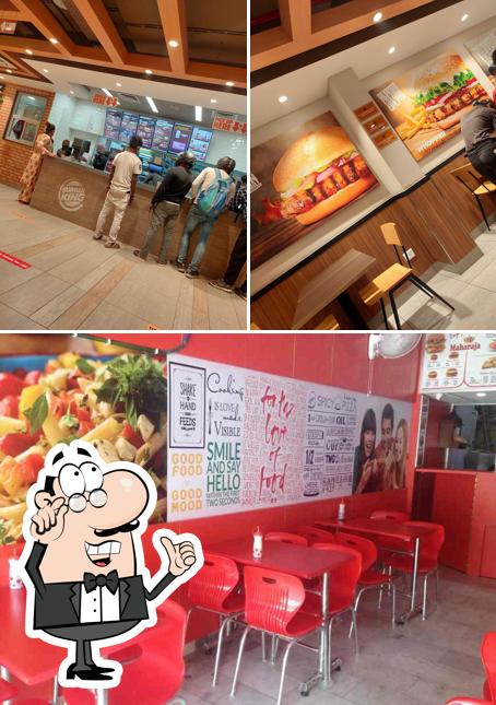 Take a seat at one of the tables at The Crunchy Burger