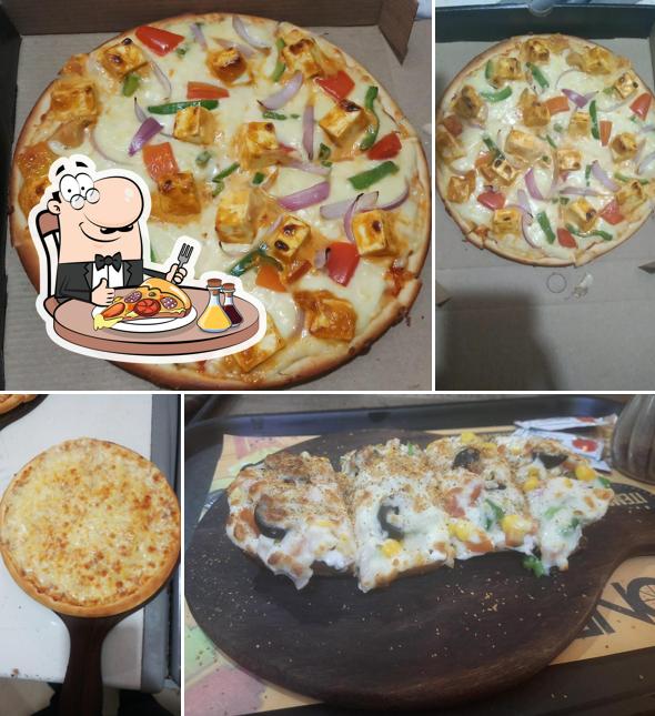 At ONE BITE RESTURANT (100% Veg), you can try pizza