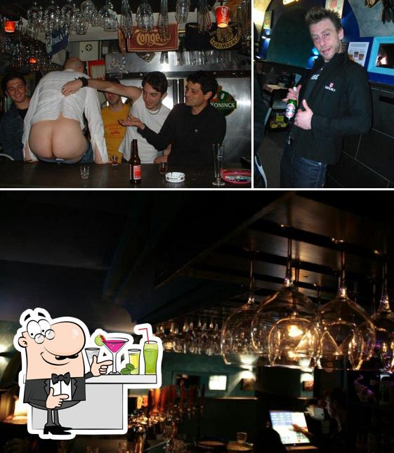 La immagine di bancone da bar e interni da Birreria Belga