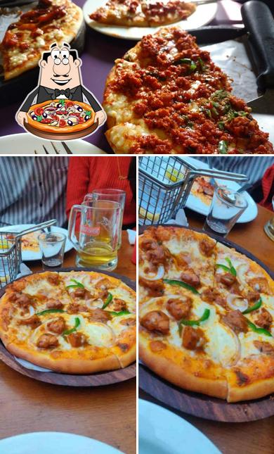 Get pizza at Pop Tate's Korum Mall