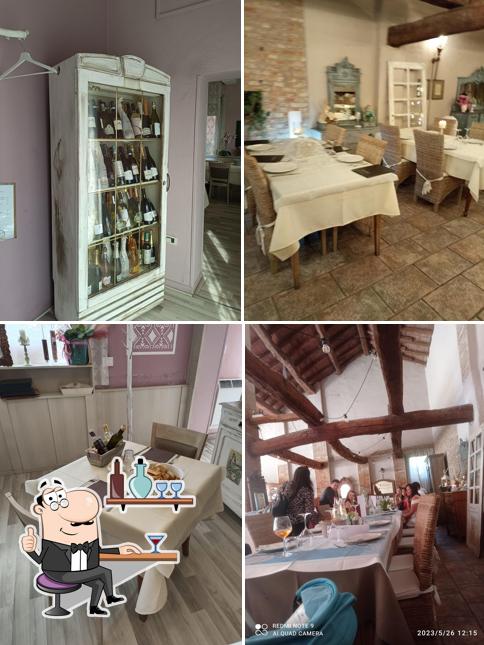 Siediti a un tavolo di Trattoria La Corte