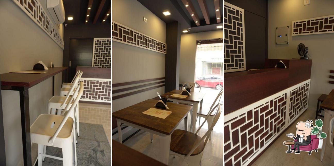 Take a seat at one of the tables at Bowl And Roll Theory