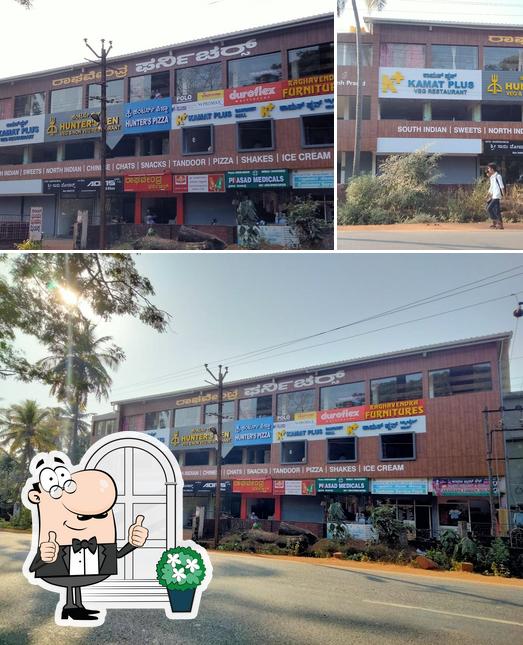 The exterior of Hunter’s Den Veg & Non-Veg Restaurant