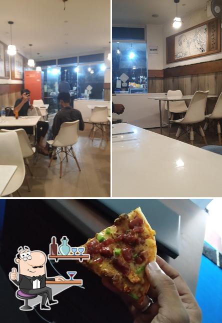 Take a seat at one of the tables at Cafe quotes