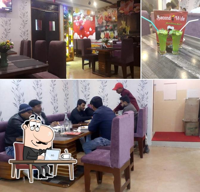 Among different things one can find interior and beverage at Second Wife Restaurant