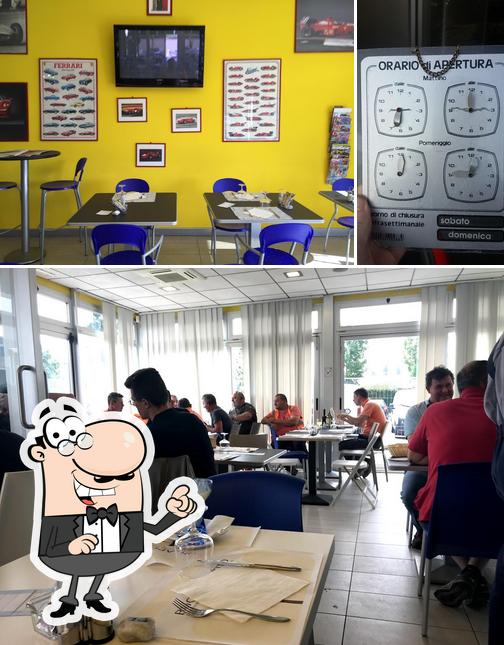 La immagine della interni e esterno di Pausa & Caffè