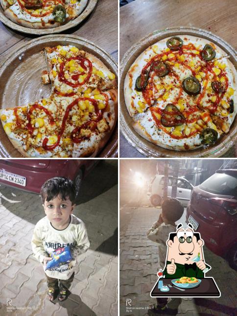 The image of Pizza Burger Zone’s food and exterior