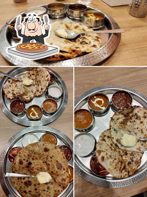 Get pizza at Shahji's Parantha House