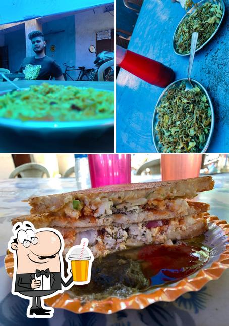 Enjoy a beverage at Dilip Bhai Food Stall
