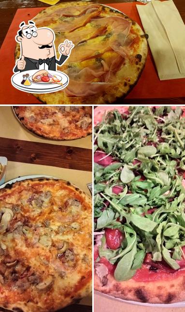 Prenditi una pizza a Pizzeria Pop Corn