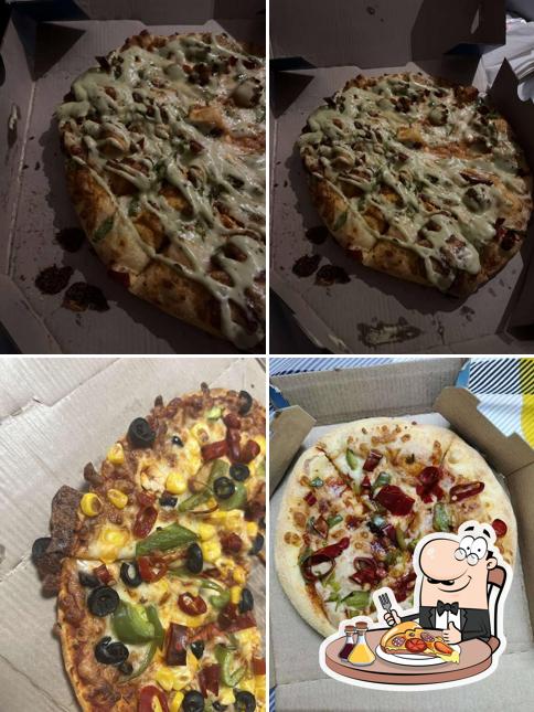 Pick pizza at Domino's Pizza Sector 125, Noida