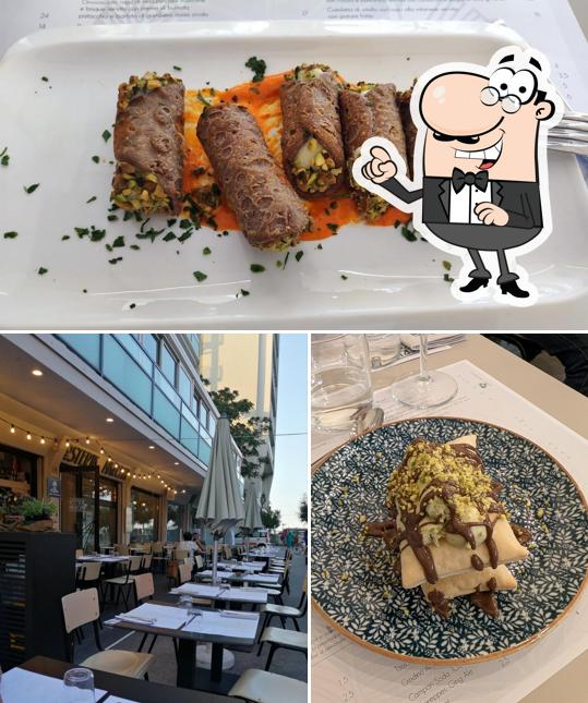 La foto della interni e cibo di Osteria Marconi