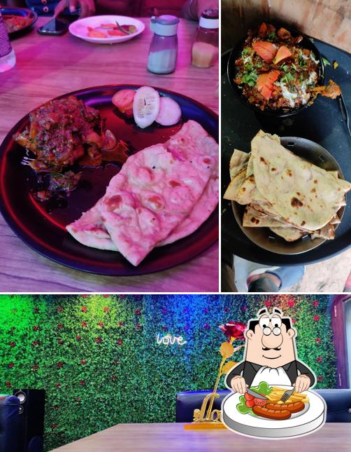 Take a look at the image showing food and interior at Zaika Restro