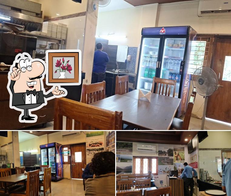 Take a seat at one of the tables at Kamat Food Court