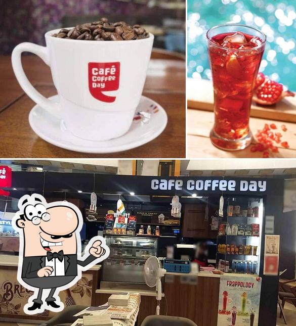 Take a seat at one of the tables at Café Coffee Day