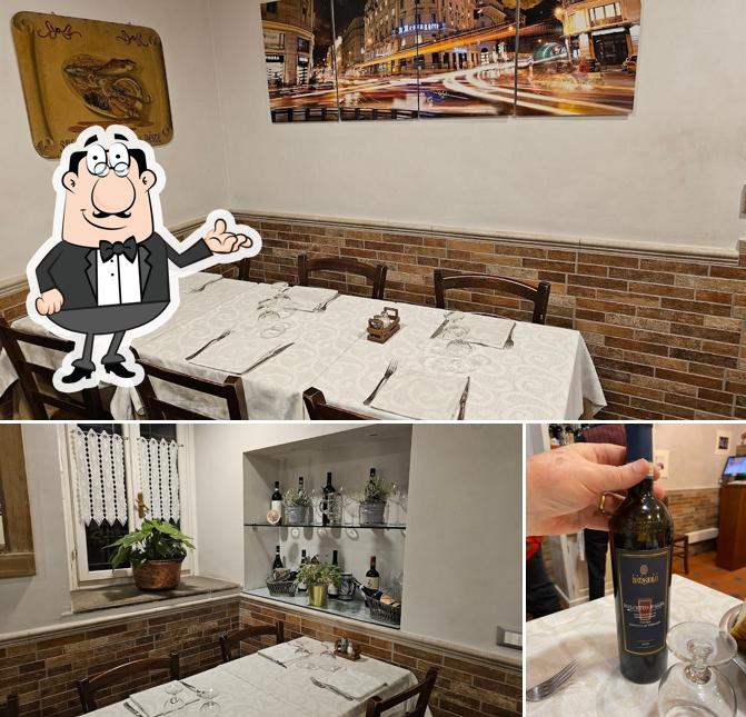 La foto di interni e vino da Da Olimpio