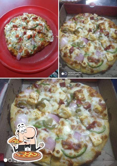 Get pizza at Food Wing