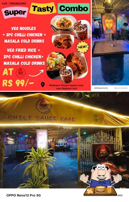The photo of food and exterior at Chili Sauce Cafe