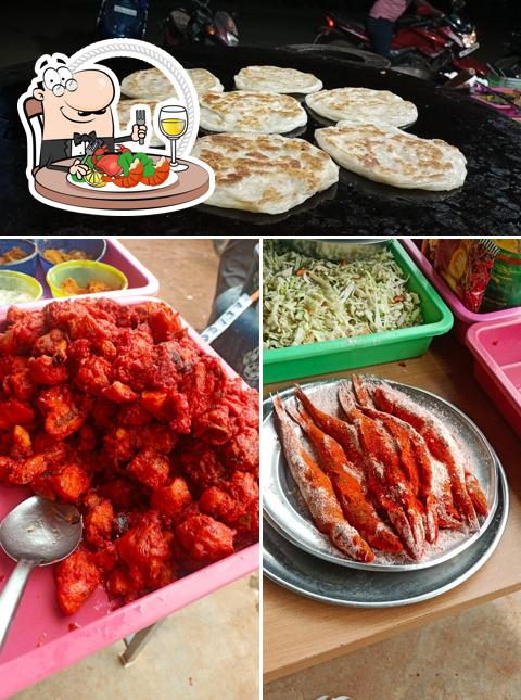 Order seafood at Hotel Saroja