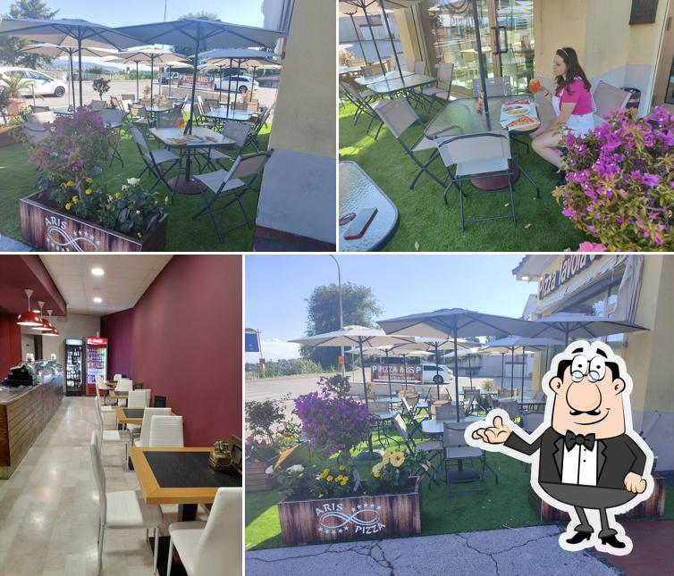 Dai un'occhiata agli interni di Pizza Aris