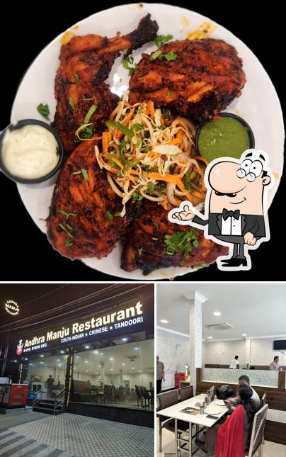 Check out the picture showing interior and food at Andhra Manju Restaurant
