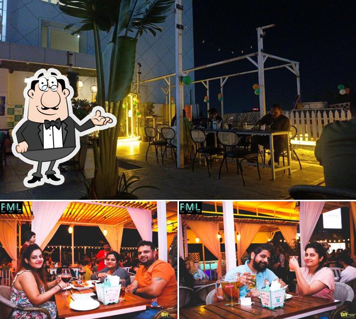 Take a seat at one of the tables at FML - Food Music Love (NIBM)