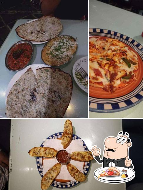 Get pizza at Shiv Sagar