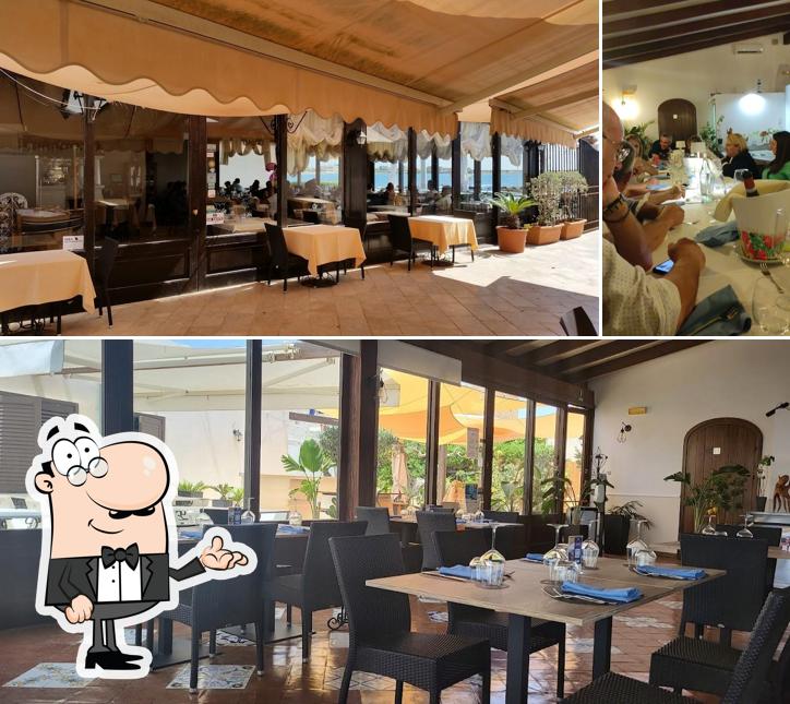 Siediti a un tavolo di Ristorante A Due Passi Dal Mare