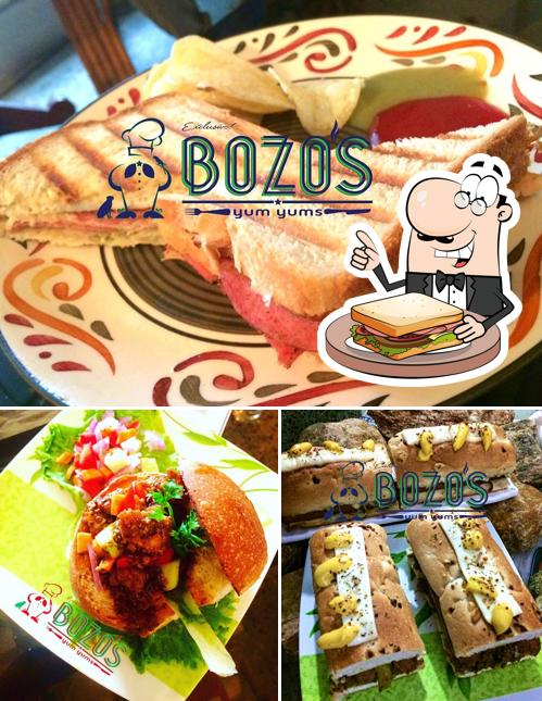 Pick a sandwich at Bozo's Yum Yums - * Burgers, Sandwiches, Wraps / Rolls, Cutlets and Crepes *