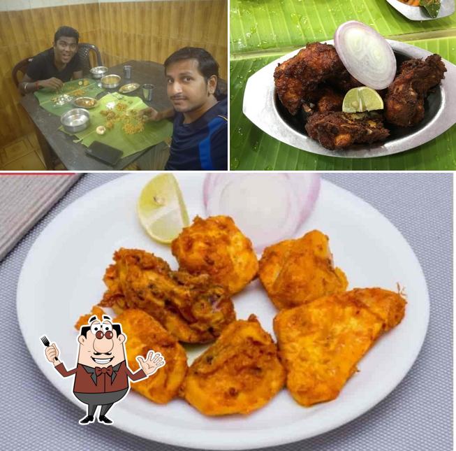The picture of food and dining table at Arul Chettinadu Hotel