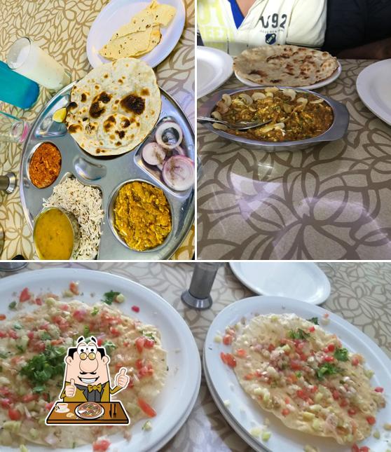 Pick pizza at ANAND RESTAURANT