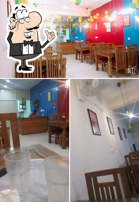 The interior of World Of Pizza