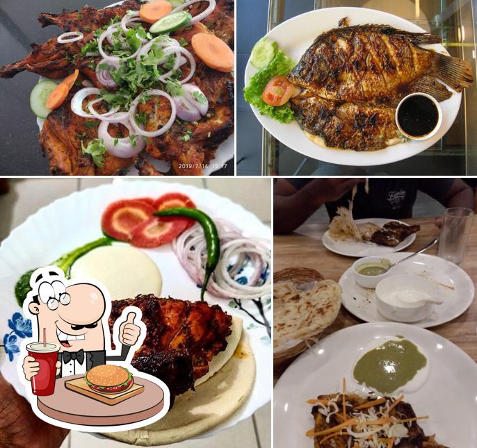 Order a burger at AL ARAB KUZHI MANDHI