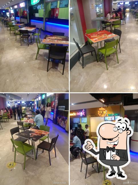 Take a seat at one of the tables at The Belgian Waffle Co