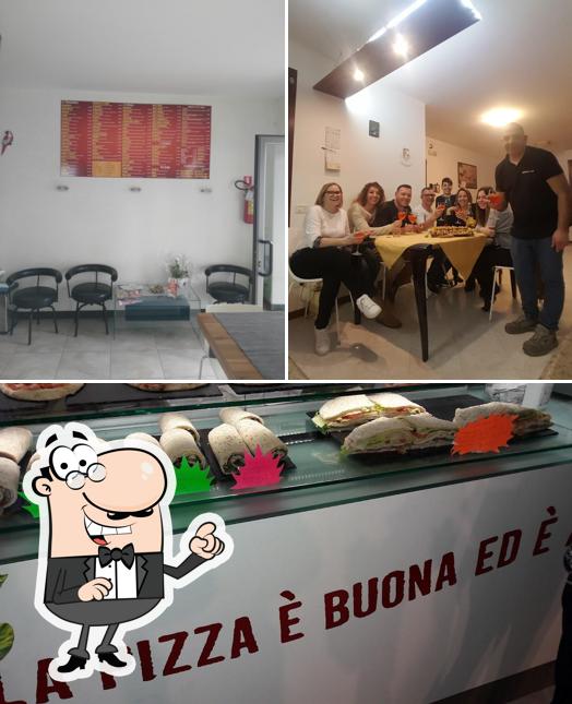 Pizzeria Al Portico si caratterizza per la interni e pizza