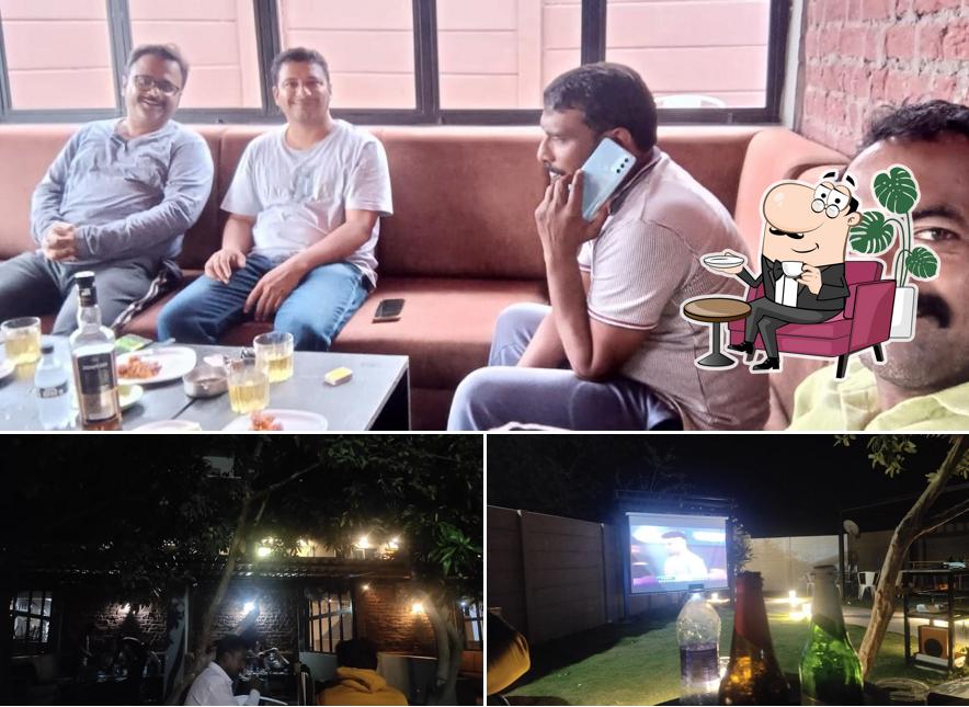 Take a seat at one of the tables at MSR FAMILY RESTAURANT & BAR