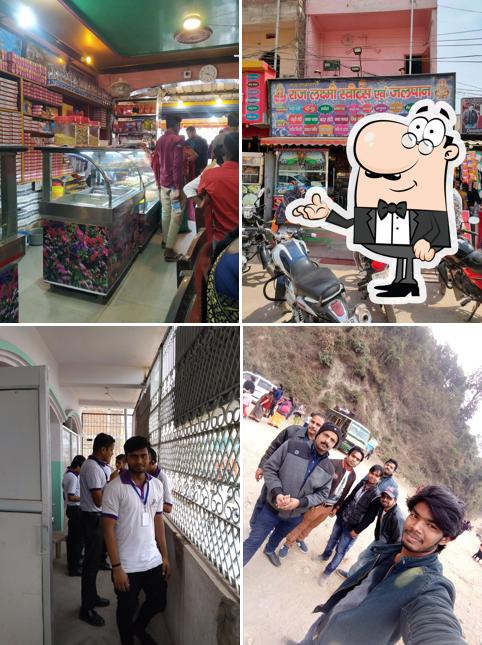 Take a seat at one of the tables at Raj Lakshmi Sweet and Jalpan